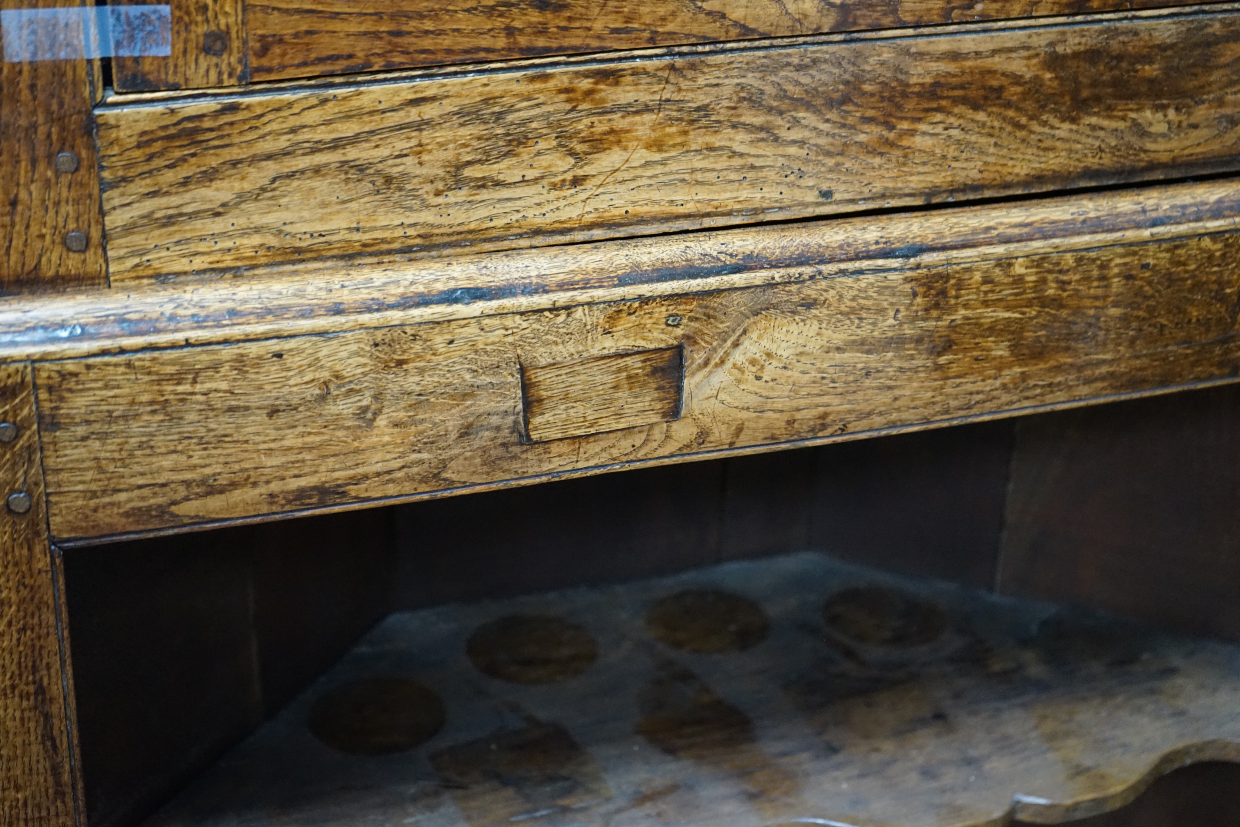 An 18th century two-sectional Provincial oak standing corner cupboard, width 80cm depth 30cm height 206cm